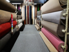 stock-photo-62932174-multi-colored-carpet-sample-rolls